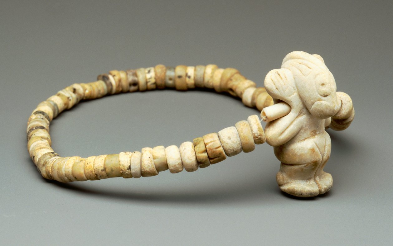Kaulakoru amuletilla tekijältä Taino Culture