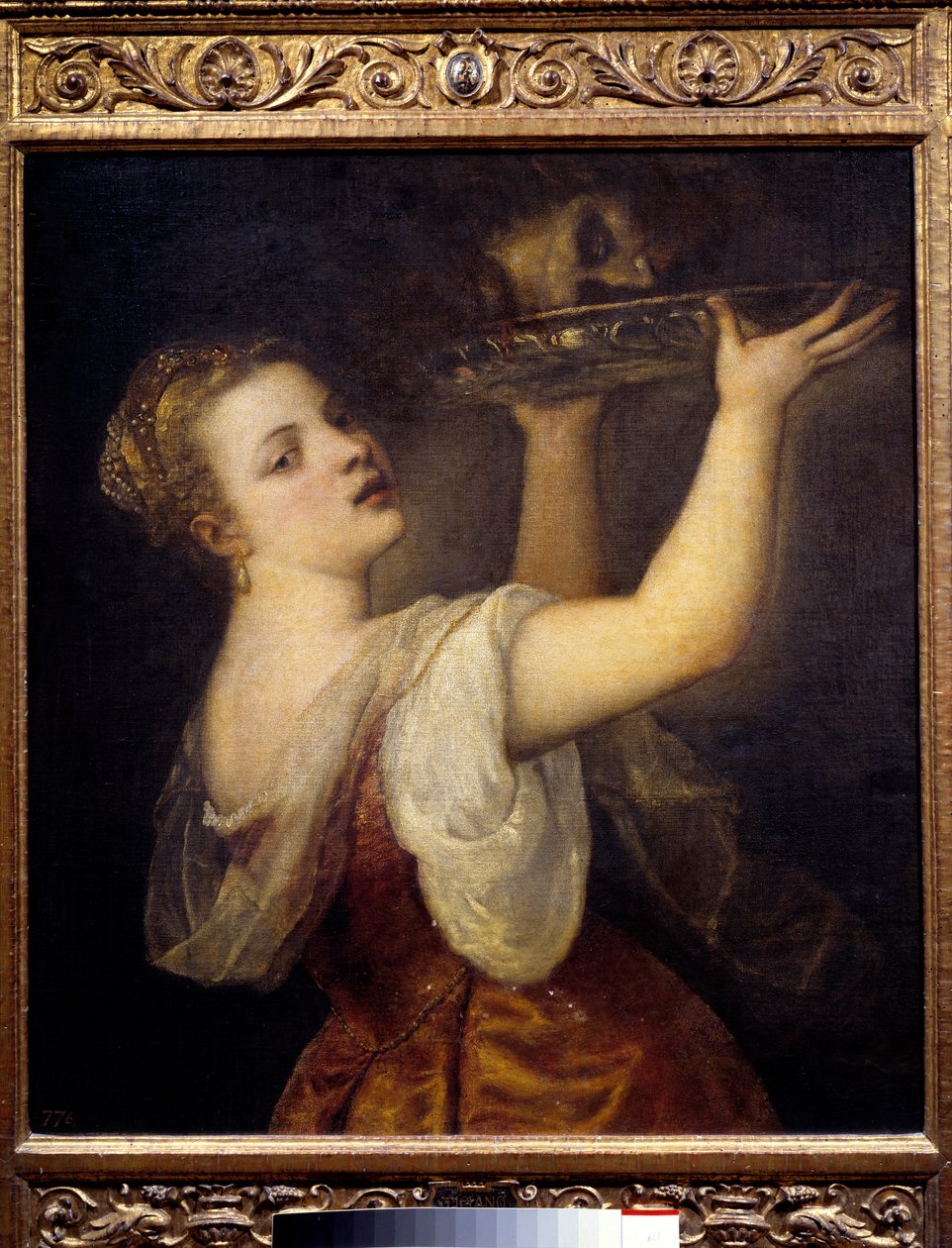 Salome pitelee Pyhän Johannes Kastajan päätä Juhlissa Herode Antipas II:n (21 eKr.-39 jKr.) kaunis tytär Salome tanssii ja pyytää Johannes Kastajan päätä lahjaksi äidilleen Herodiadelle. Tiziano Vecellio cal tekijältä Tiziano Vecelli