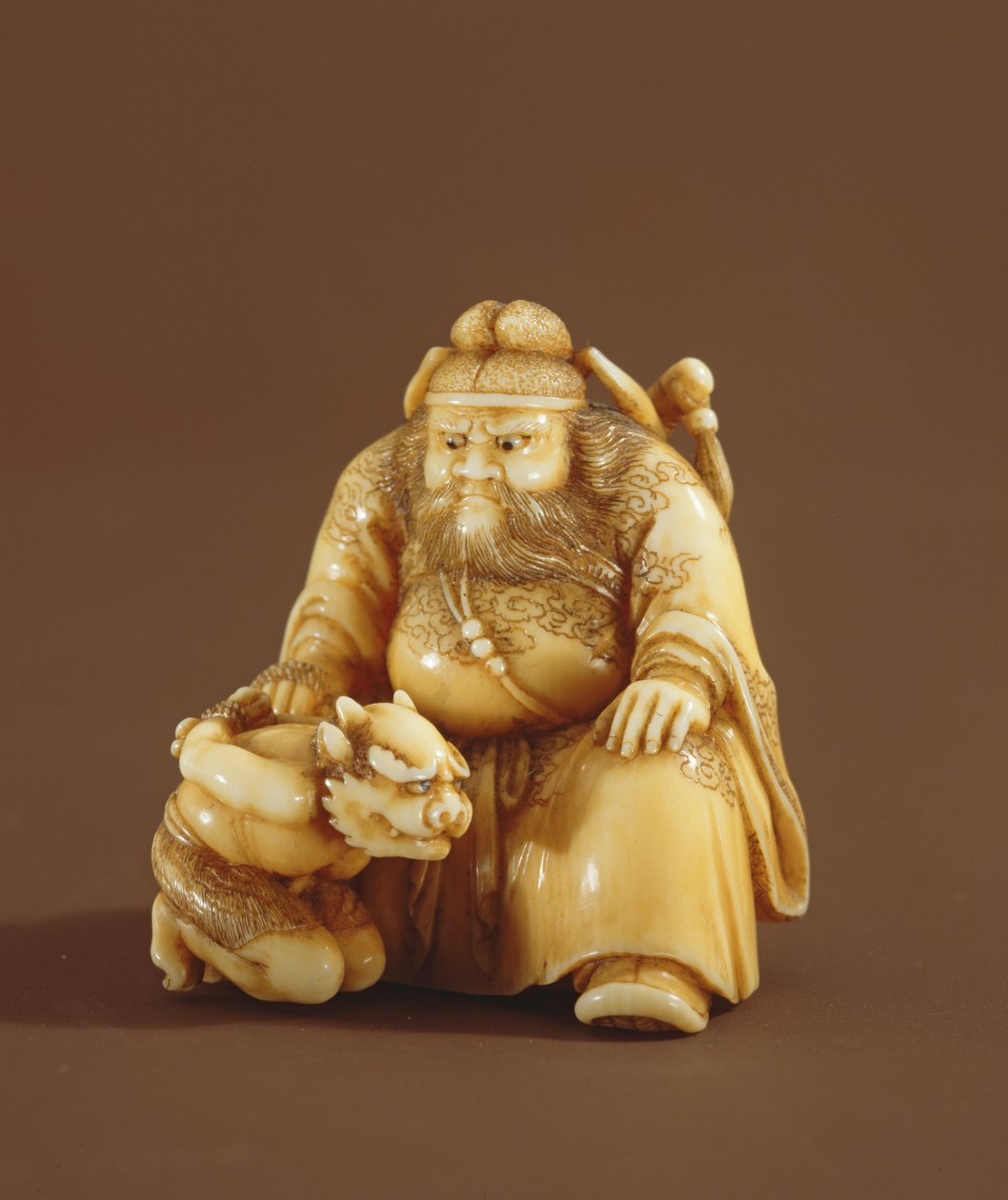 Netsuke demonin tukahduttajana ja pienen demonin muodossa, Meiji-kausi (1868-1912) tekijältä Tokoku