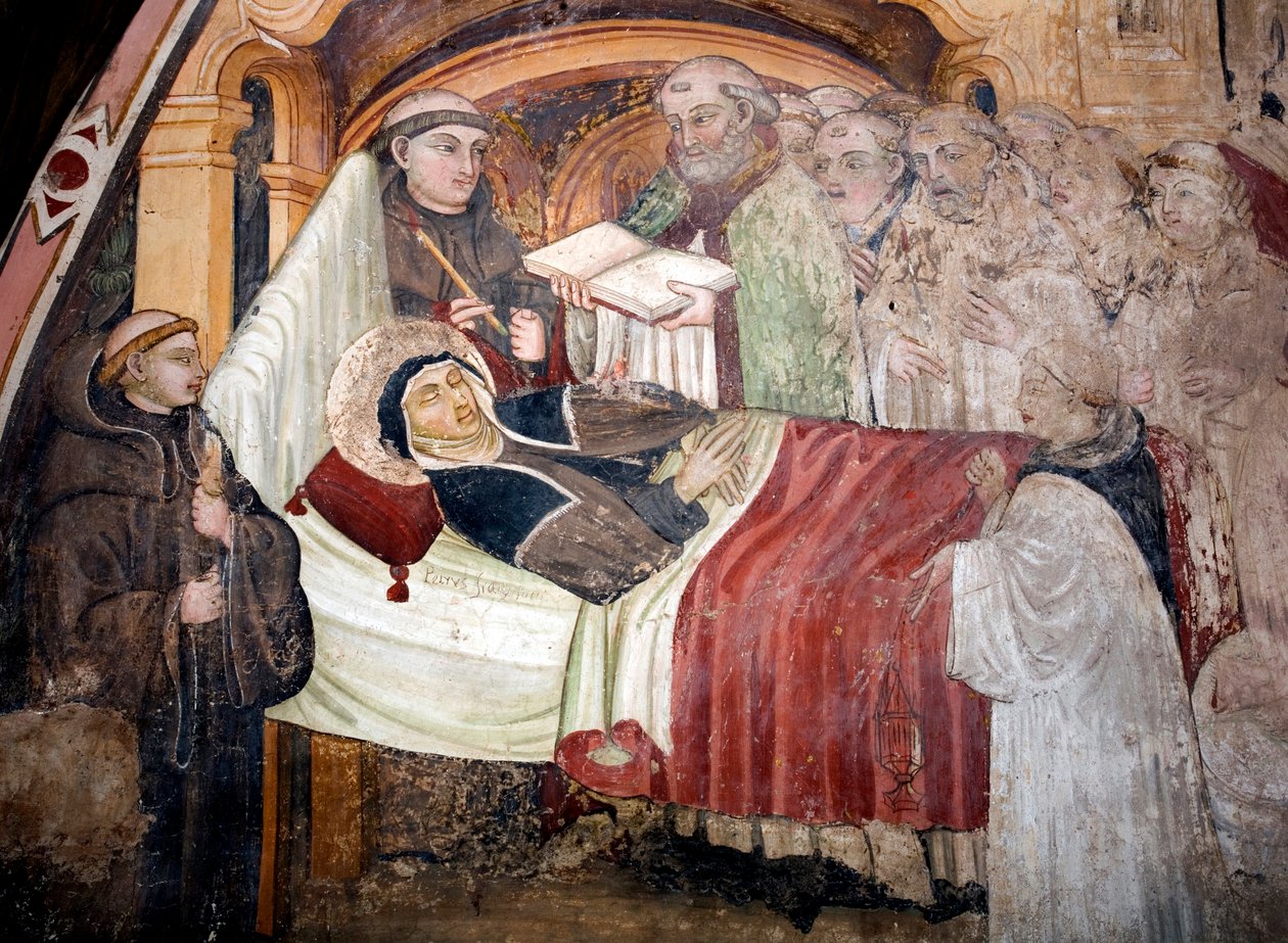 Pyhän Benedictin Nursielaisen sisaren Saint Scolasticuksen (jae 480-543) kuolema Häntä ympäröivät benediktiinimunkit. Umbrian koulukunnan fresko 1400-luvulta. Pyhän Benedetton luostari (Sacro Speco), Subiaco (Rooma), Italia tekijältä Umbrian School