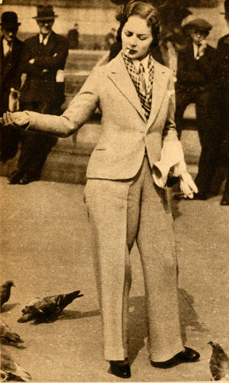 Kihlattu nainen ruokkimassa kyyhkysiä Trafalgar Squarella, 1933. tekijältä Unbekannt