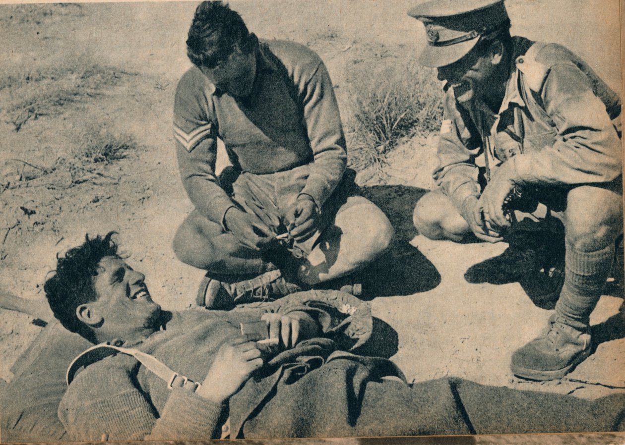 Ambulanssimiehiä haavoittuneen panssarintorjuntatykistön kanssa, c1942 1944 tekijältä Unbekannt