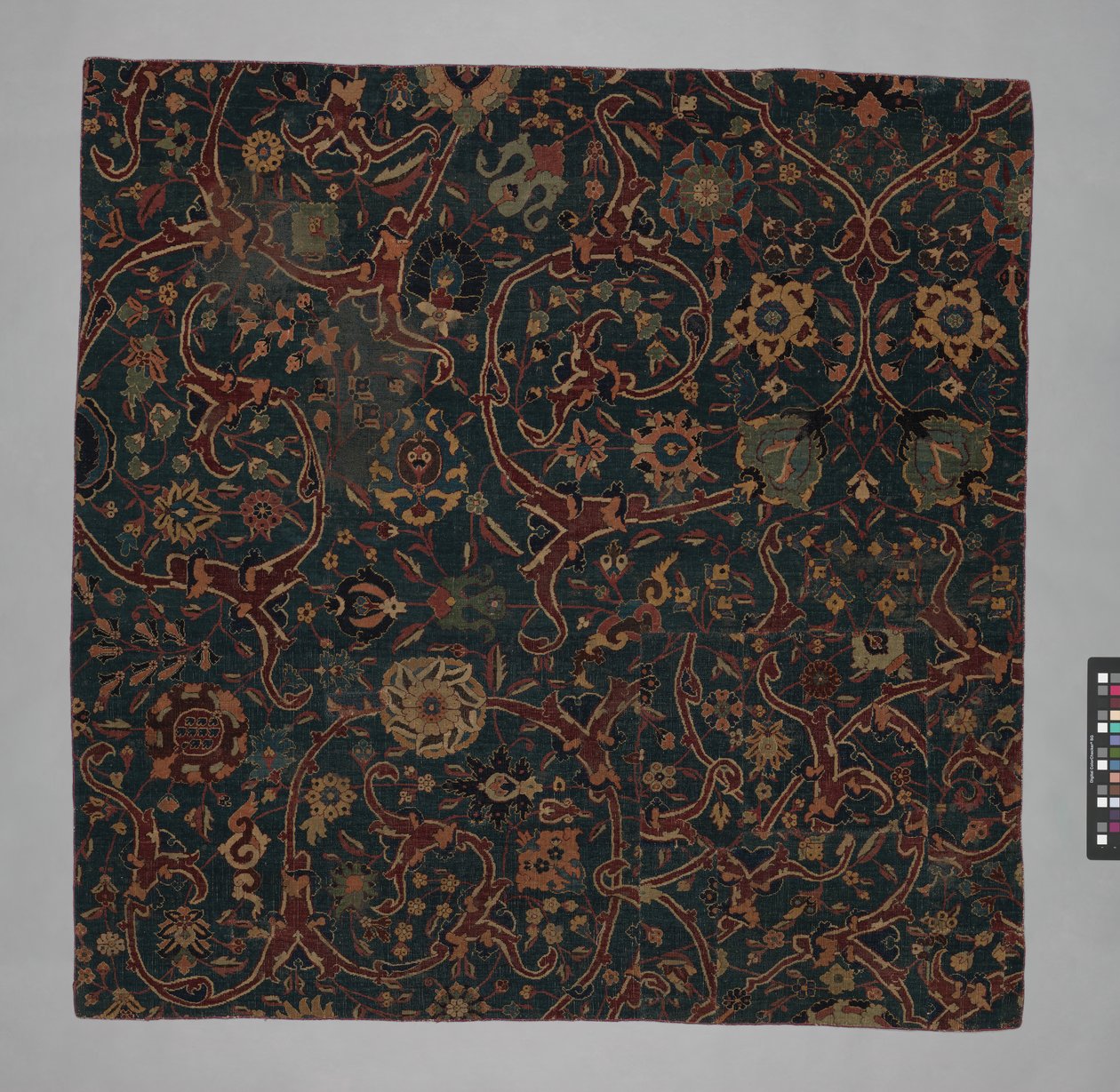 Sinijauhettu mattofragmentti vierivillä kukkaköynnöksillä, Iran, 1600-luku. tekijältä Unbekannt