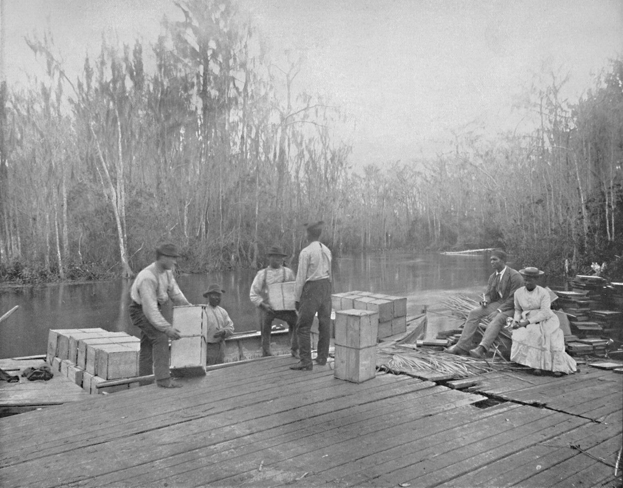 Ladataan appelsiineja Ocklawaha-joella, Floridassa, c1897. tekijältä Unbekannt