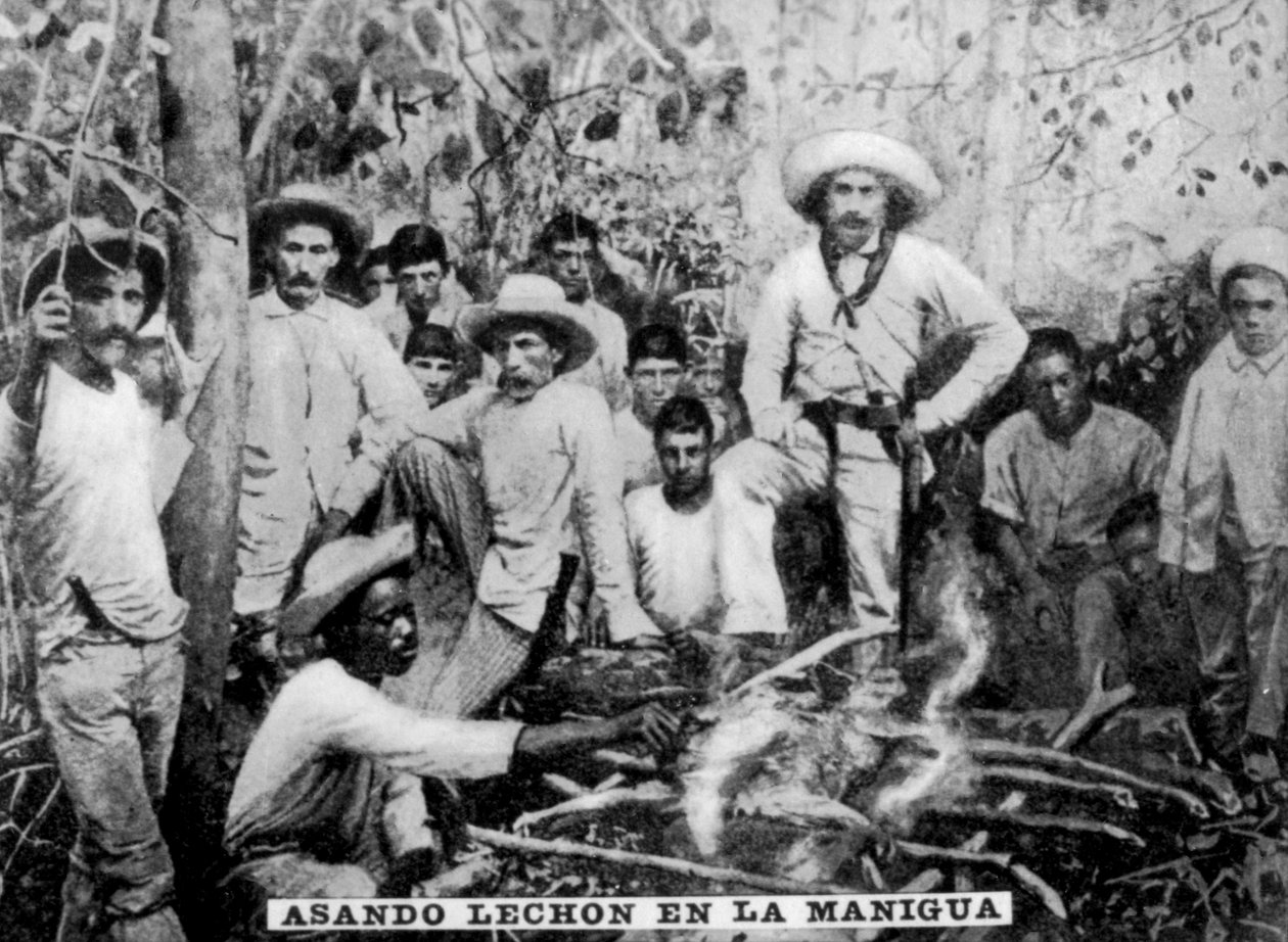 Porsaan paahtaminen viidakossa, Kuuba, vuodelta 1910 tekijältä Unbekannt