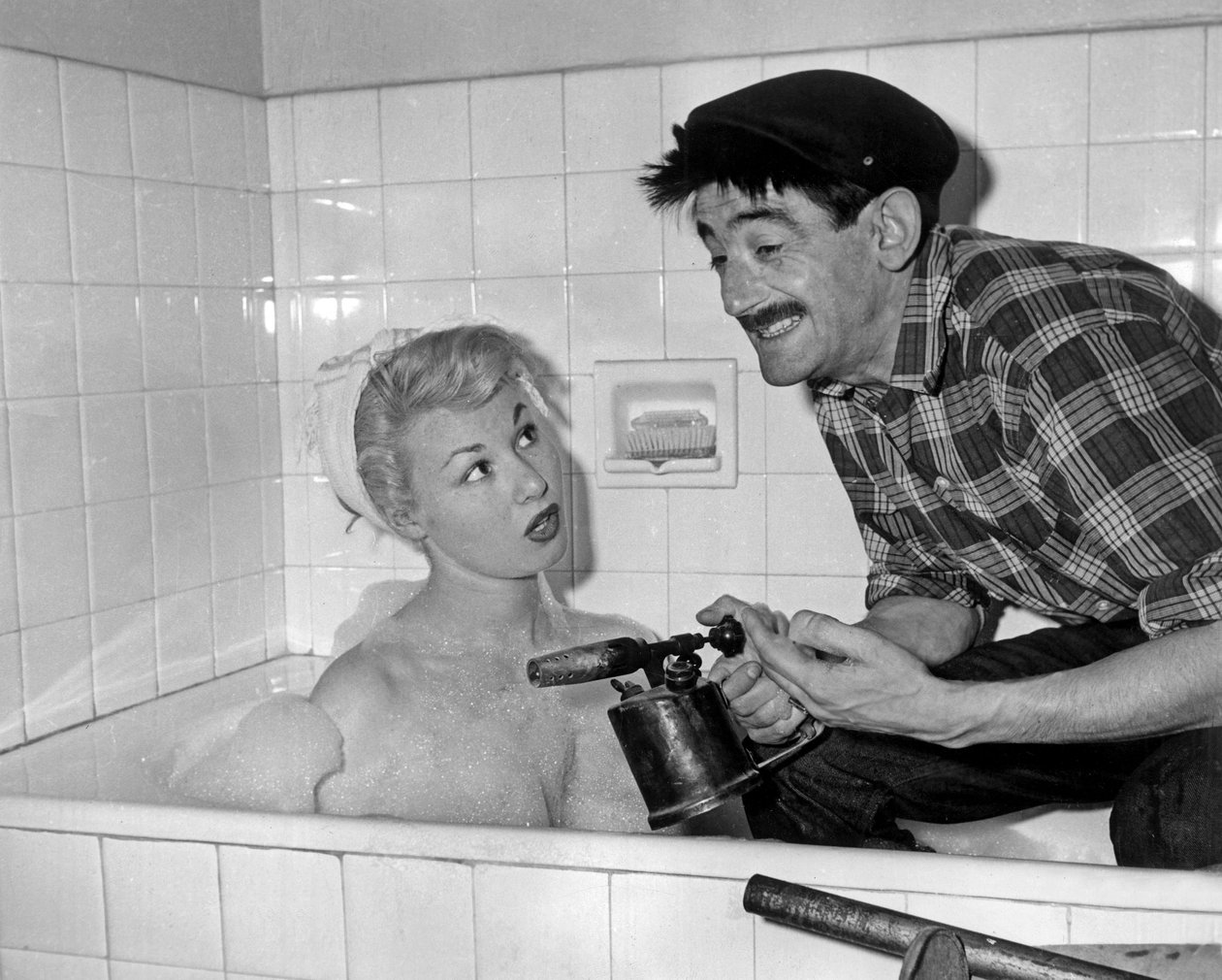 Nadine Tallier (nykyisin Baroness Nadine De Rothschild) ja Maurice Gardett illan aikana kotona Pariisissa 27. maaliskuuta 1961 tekijältä Unbekannt Unbekannt