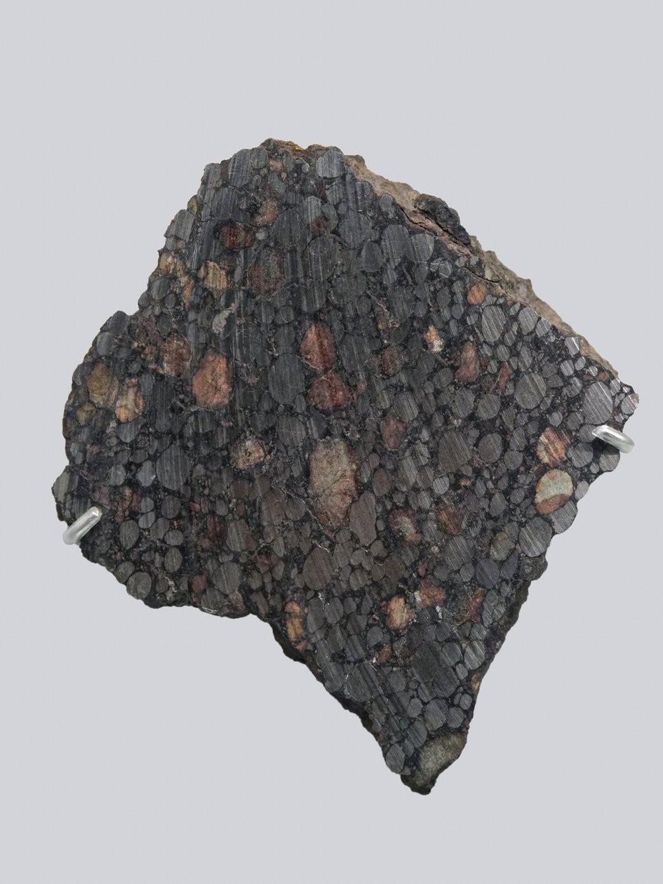 Carbonee chondrite (CBA). Tombee Gujbassa (Nigeria) vuonna 1984. National Museum of Natural History, Pariisi. tekijältä Unbekannt