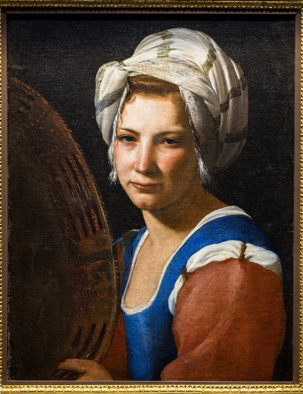 Mustalainen tamburiinin kanssa tekijältä Unknown artist