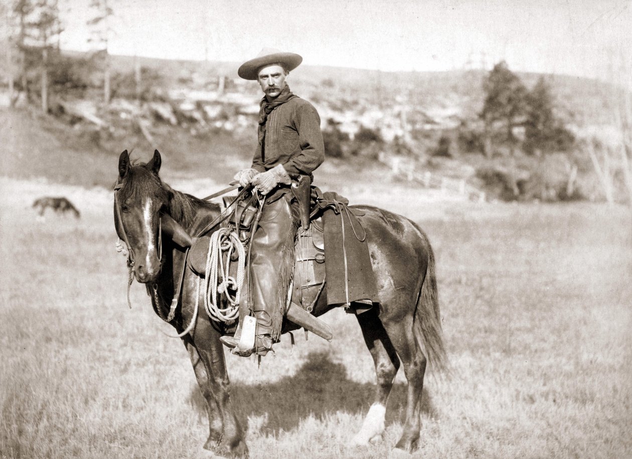 Cowboy hevosen selässä - kuva tekijältä Unknown photographer
