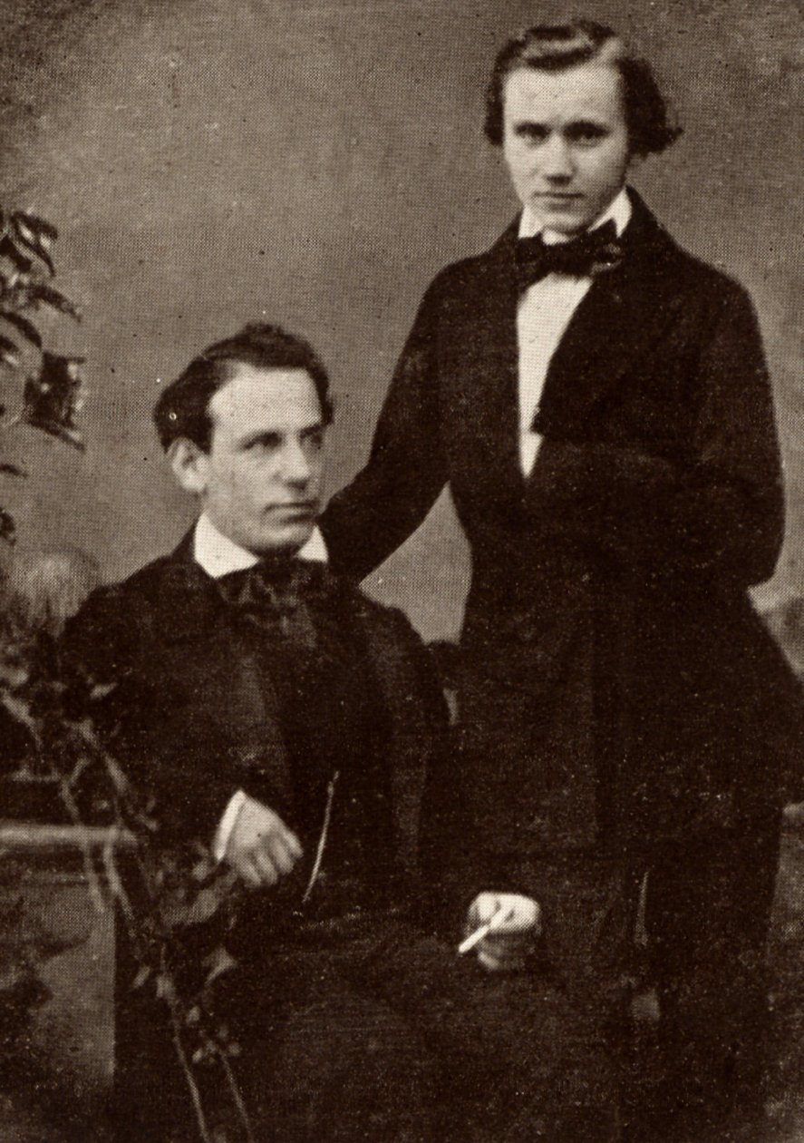 Johannes Brahms (1833-1897) saksalainen säveltäjä, seisoo, ja pakolainen unkarilainen viulisti Eduard Remenyi (1828-1898), jonka kanssa hän lähti kiertueelle (puolikuva valokuvasta). tekijältä Unknown photographer
