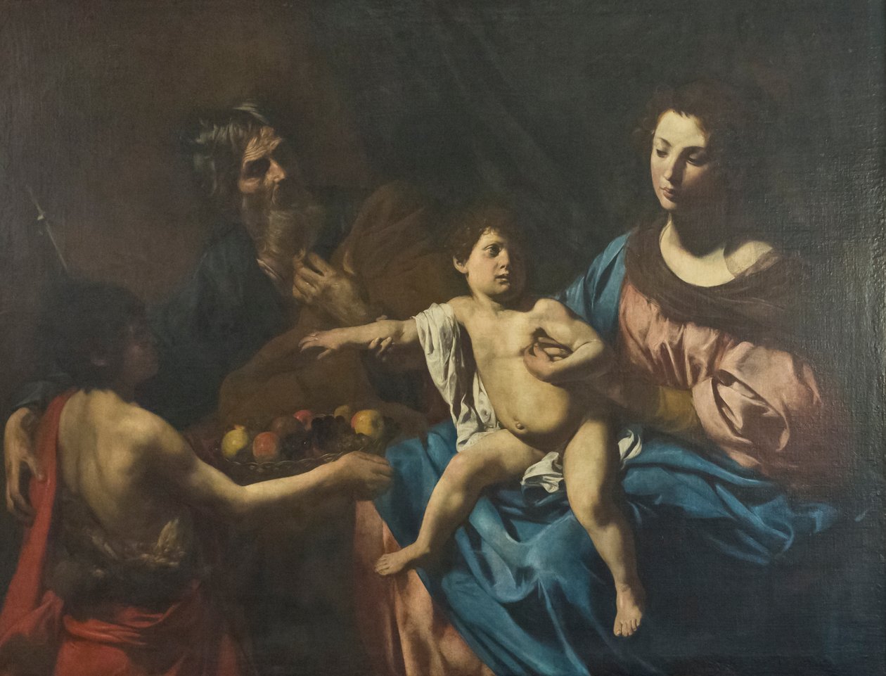 Pyhä perhe nuoren Johannes Kastajan kanssa tekijältä Valentin de Boulogne