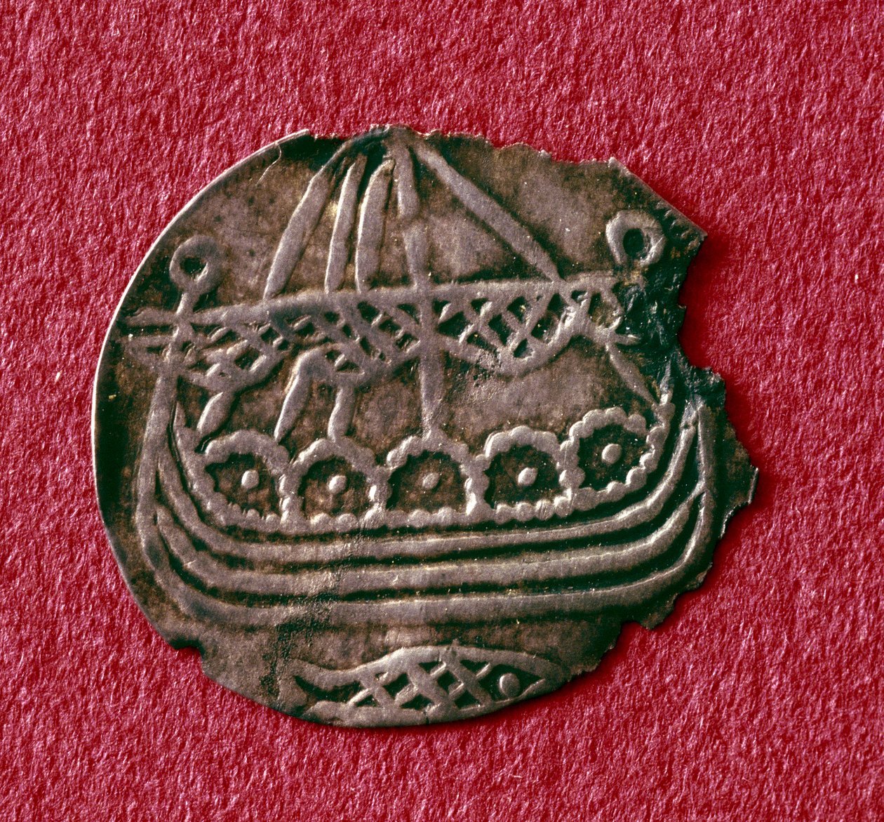 Drakkaria (metallia) kuvaava kolikko tekijältä Viking Viking