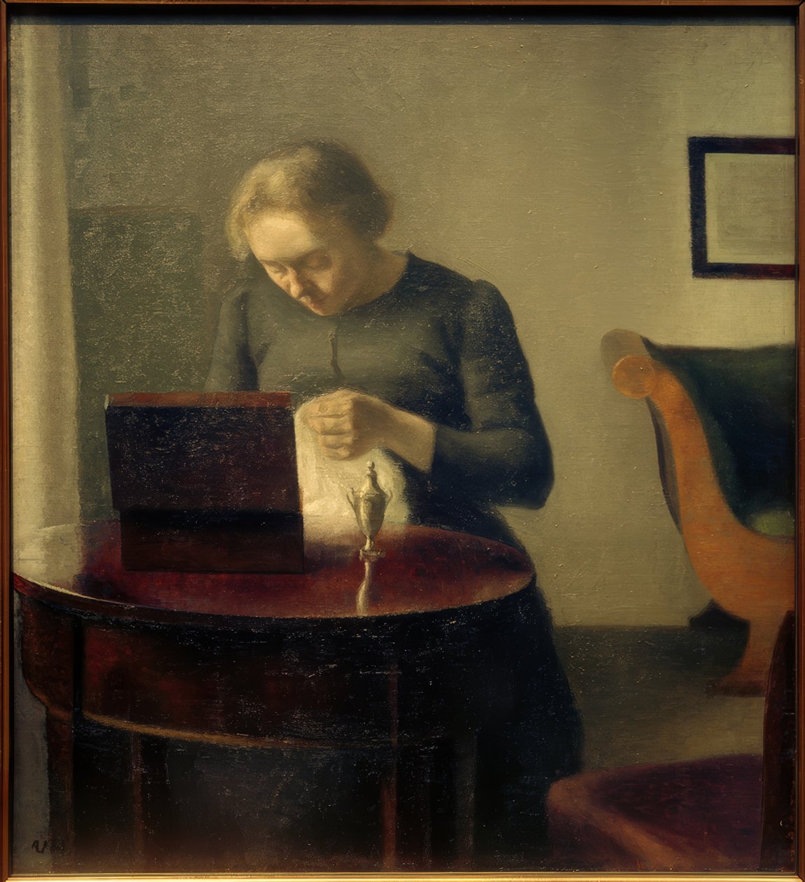 Frau d.Künstlers am Nähtisch tekijältä Vilhelm Hammershoi