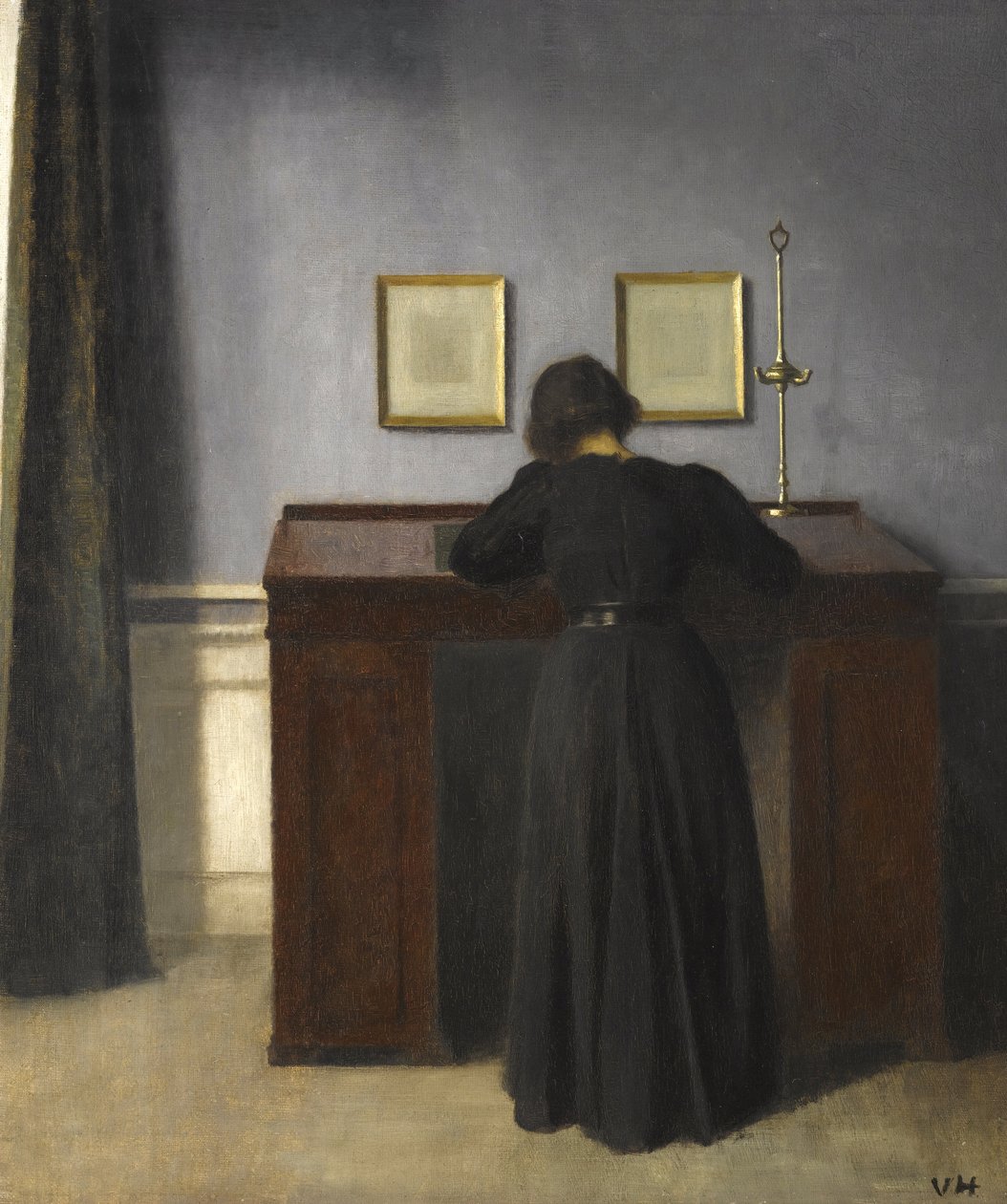 Ida seisoo pöydän ääressä, 1900 tekijältä Vilhelm Hammershoi