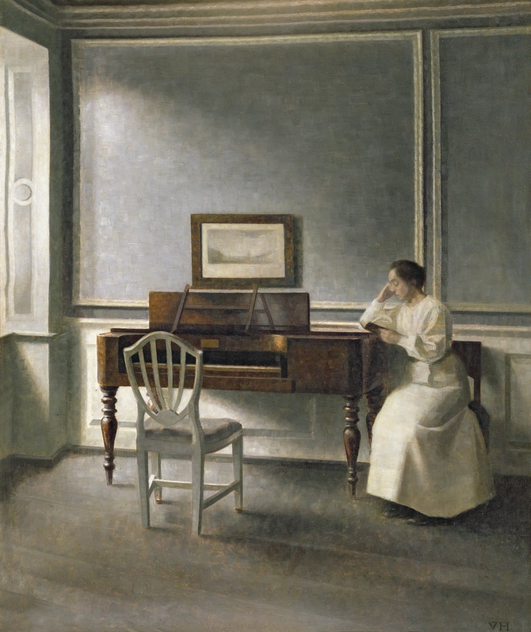 Nainen lukee pianolla, 1907 tekijältä Vilhelm Hammershoi