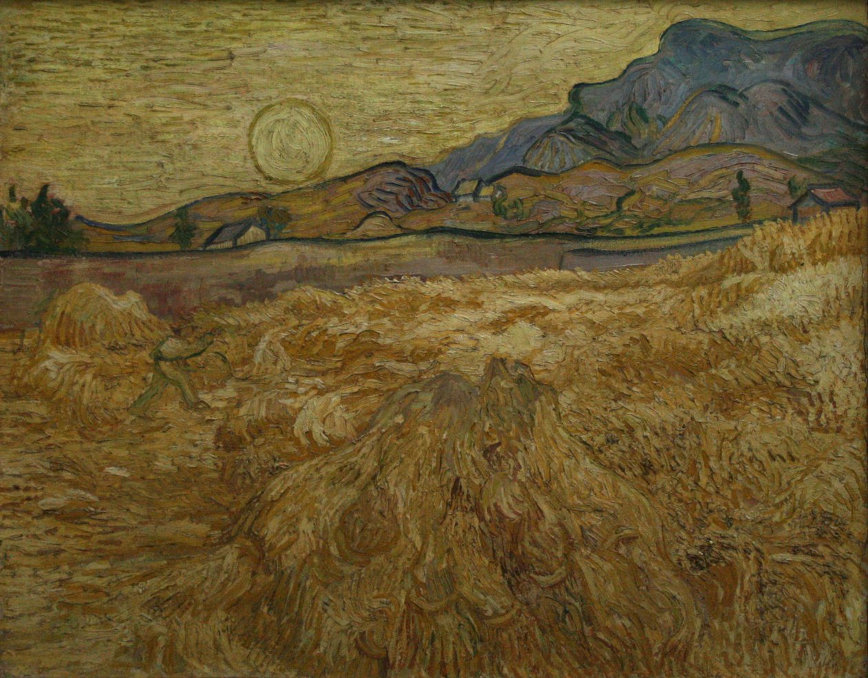 Maissipelto niittokoneen ja auringon kanssa tekijältä Vincent van Gogh