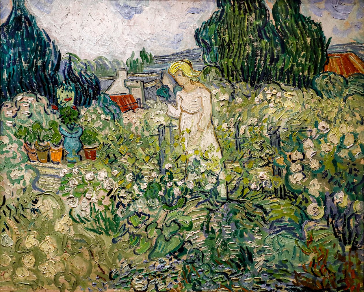 Neiti gachet puutarhassaan Auvers-sur-Oisessa tekijältä Vincent van Gogh
