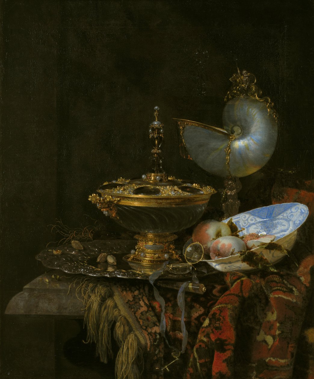 Pronk asetelma Holbein Bowlilla, Nautilus Cupilla, lasikupilla ja hedelmälautasella tekijältä Willem Kalf