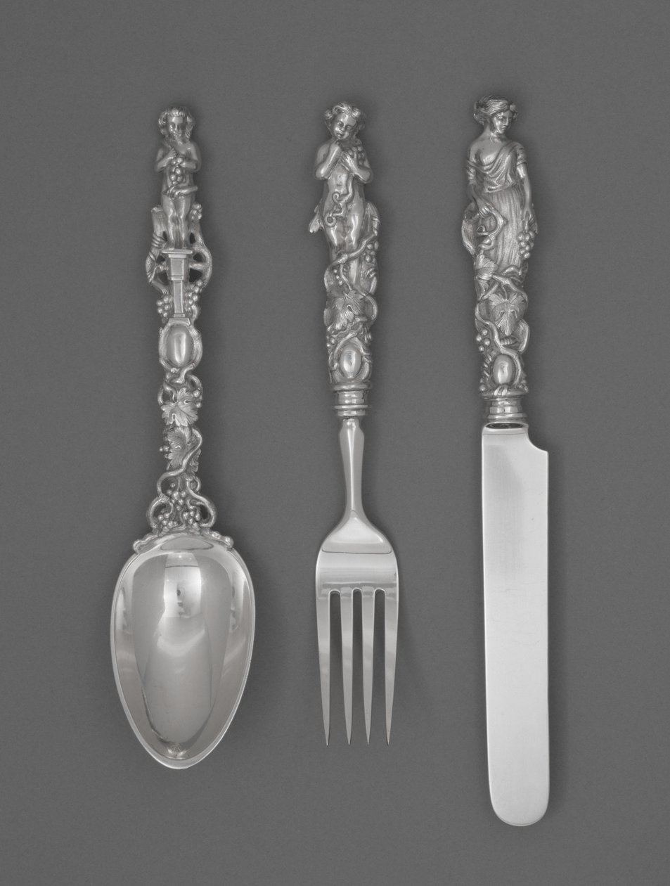 Lasten ruokailuvälinesarja (veitsi, haarukka ja lusikka), n. 1865-1874 (hopea) tekijältä William Bogert