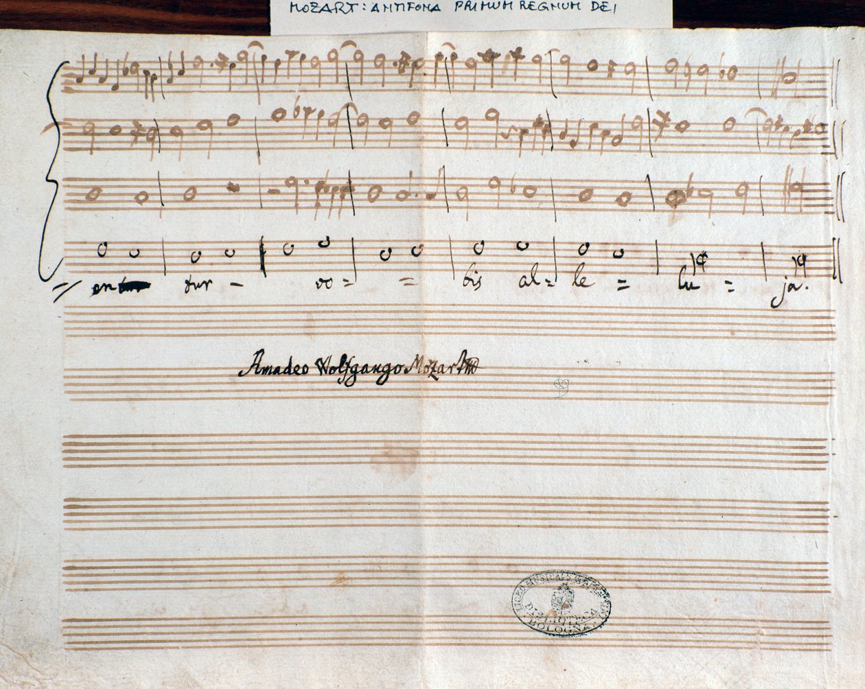 Sivu, jossa on säveltäjän allekirjoitus Querite ensimmäistä kertaa Jumalan valtakunnassa Mozartin toimesta saadakseen arvonimen Accademico filarmonico (1770) tekijältä Wolfgang Amadeus Mozart