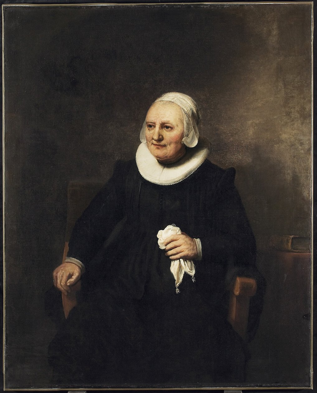 Muotokuva istuvasta naisesta nenäliinalla, 1644 tekijältä studio of Rembrandt Harmensz. van Rijn