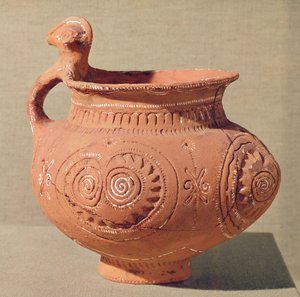 Hautajaismaljakko, jossa on antropomorfinen kahva tekijältä Age Bronze