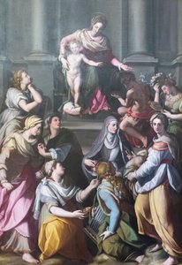 Madonna istuu valtaistuimella Childin kanssa pyhimysten ja hahmojen ympäröimänä tekijältä Alessandro Allori