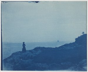 Nainen katselemassa kuuneria Rocky Promontorysta tekijältä American Photographer
