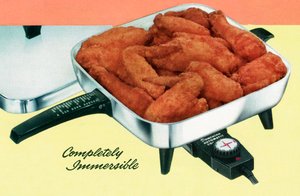 Kanan paistaminen retro-sähköpannulla tekijältä American School