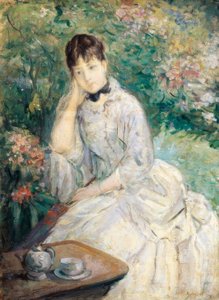 Nuori nainen istuu sohvalla, tekijältä Berthe Morisot