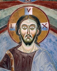 Christ Pantocrator kasvot, yksityiskohta romaanisista freskoista bysanttilaiseen tyyliin, 1000-luvun loppu, Pyhän Eldradin ja Pyhän Nikolauksen kappeli, Novalesan luostari, Piemonte, Italia tekijältä Byzantine