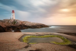 Rannikon majakka auringonlaskun aikaan tekijältä Christoph Schaarschmidt