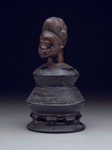 Voidepurkki, jossa kuvakansi, 1900-luvun alkupuolelta puoliväliin (puu) tekijältä Culture Baule