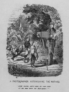 Valokuvaaja hämmästelee alkuasukkaita (litografia)