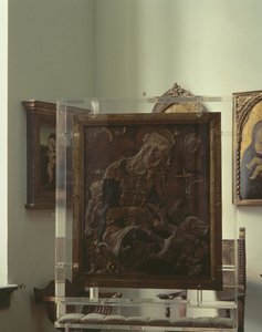 Madonna ja lapsi (monivärinen kipsi, puu, nahka, lasi) tekijältä Donatello