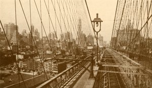 Lower Manhattan nähtynä Brooklynin riippusillan kaapeliverkon kautta, c1930. tekijältä ENA