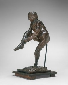 Tanssija pukeutuu sukkiinsa tekijältä Edgar Degas