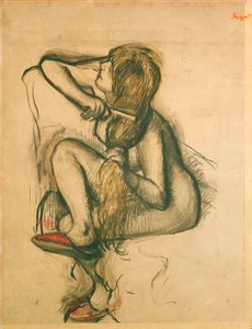 Nainen kampaa hiuksiaan tekijältä Edgar Degas