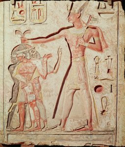 Ramses (1279 - 1213 eaa.) lyömässä vihollisiaan (maalattu kalkkikivireliefi, 19. dynastia).