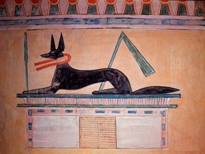 Saakaalipäinen Anubis, muumioitumisen jumala. Prinssi Khaemweset II:n haudan seinä (maalattu kalkkikivikoristelu, 20. dynastia)