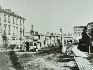Kilburn Toll Gate Kilburn High Roadin eteläpäässä Kilburn Prioryn risteyksessä, Camden Libraries, 1875 tekijältä English Photographer