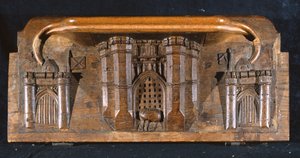 Kurjuus, joka kuvaa Sir Yvainsin hevosta loukussa, kun hienostuneen linnan sisäänkäynnin portti lasketaan alas, New College Chapel, Oxford, 1300-luvun loppu (puuta)