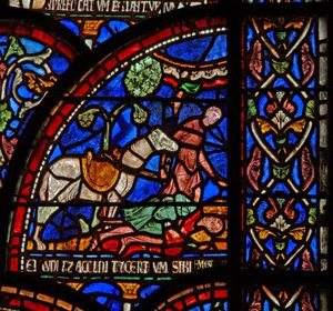 Windows 7 kuvaa kohtauksen St Thomas Becket Miracle -ikkunasta: William of Gloucester on haudattu, mutta hänen äänensä kuuluu tekijältä English School