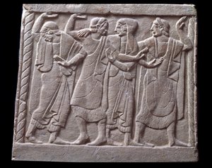 Tanssikohtaus, marmorihautakiven matala kohokuvio tekijältä Etruscan Etruscan
