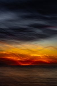 Eläväinen auringonlasku merellä