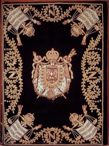 Kansi yhdestä kahdestatoista alkuperäisestä "Code civil des francais" -julkaisusta, jonka Napoleon Bonaparte julkaisi 21.3.1804. Se on sidottu kultaa ja hopeaa olevaan samettikirjontaan, jossa on oikeudenmukaisuuden tunnus ja keisarin käsivarret. Ranskan k tekijältä French School