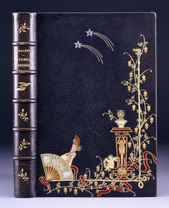 Upper book cover of two shooting-stars, a torch, foliage, faun on pedestal, putto and a leg behind a fan, 1893 tekijältä French School