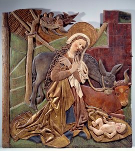 Nativite Reliefi alttaritaulun sisäpuolella saksalaisen koulun moniväristä puuta. 1510 Koko 1,12x1,11 m Pariisi, Musee du Louvre tekijältä German School