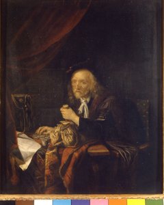 Epäluuloinen mies laskee rahansa pitämällä kukkaroa kädessään. Gerard Doun (tai Gerrit Dow