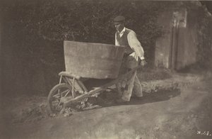 Miespuolinen talonpoika kottikärryillä, 1870.